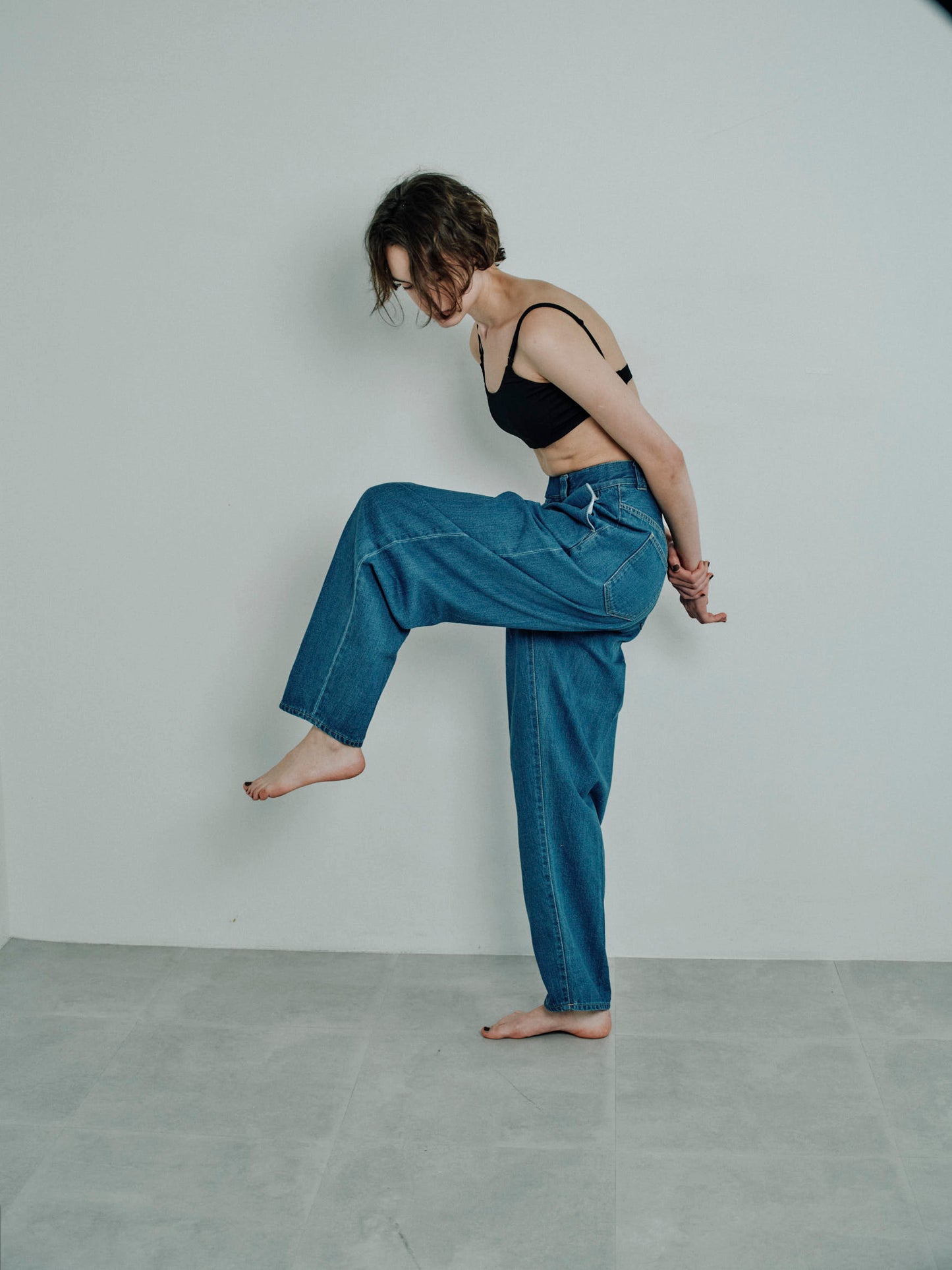 tuck curve loose fitting jeans